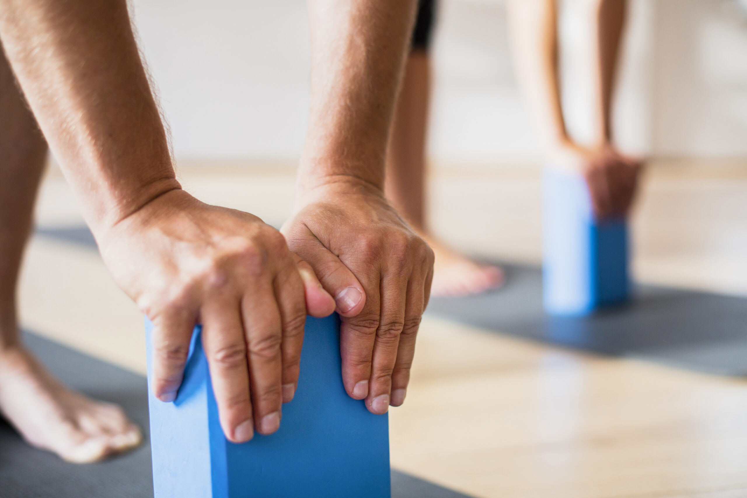 close-up-friends-training-with-pilates-blocks