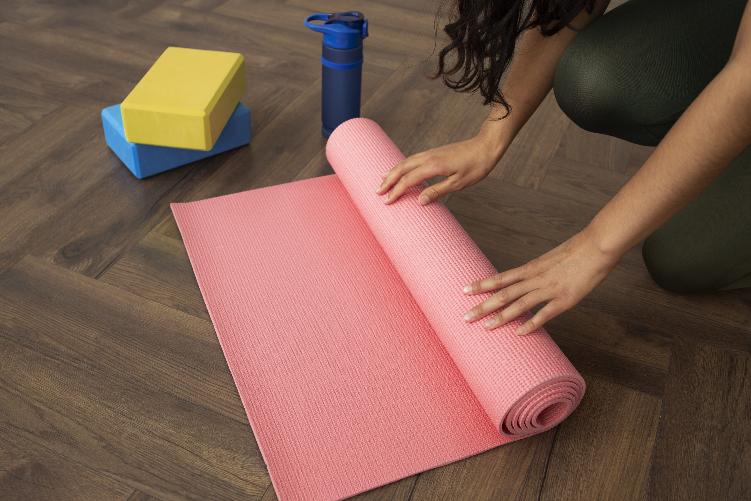 young-woman-with-yoga-essentials